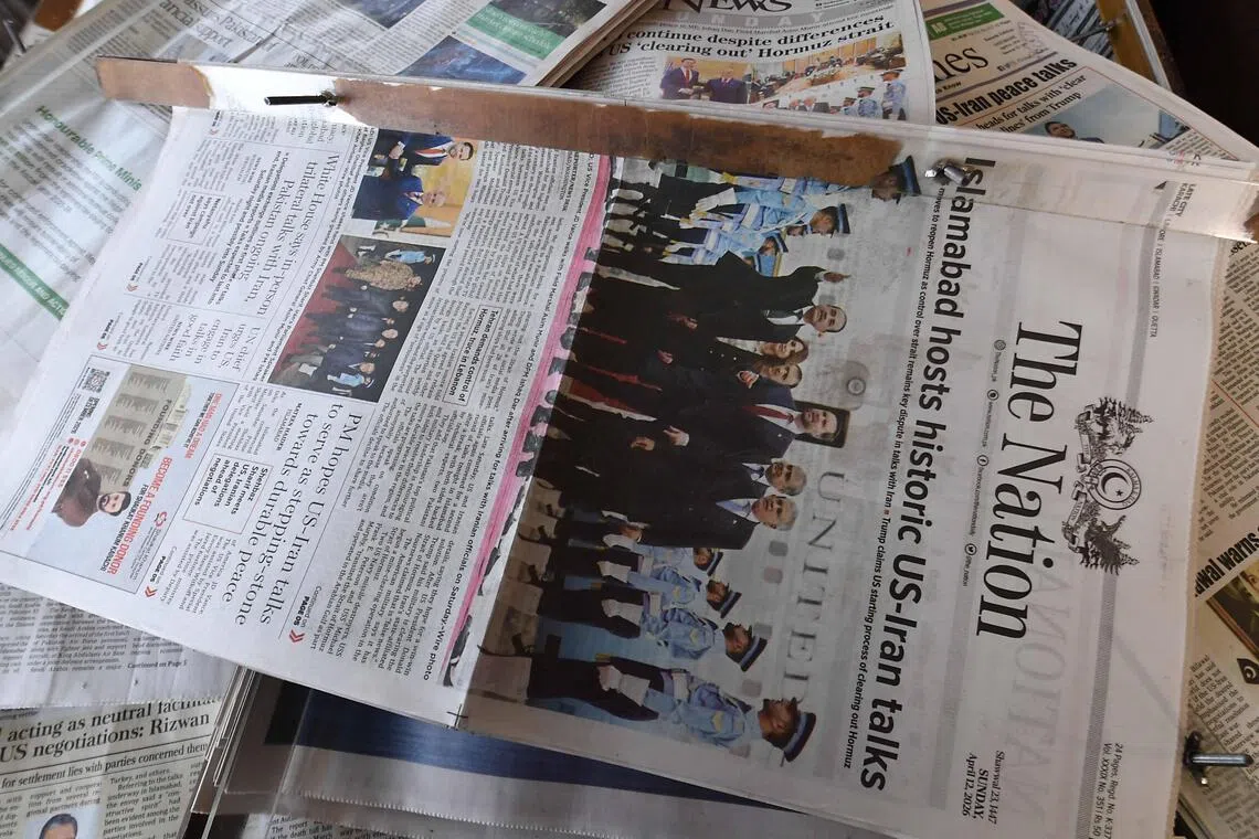 Newspapers are displayed after US-Iran peace talks Pakistan, on April 12, 2026, after Iran and the US failed to reach an agreement after peace talks held in Islamabad a day before.