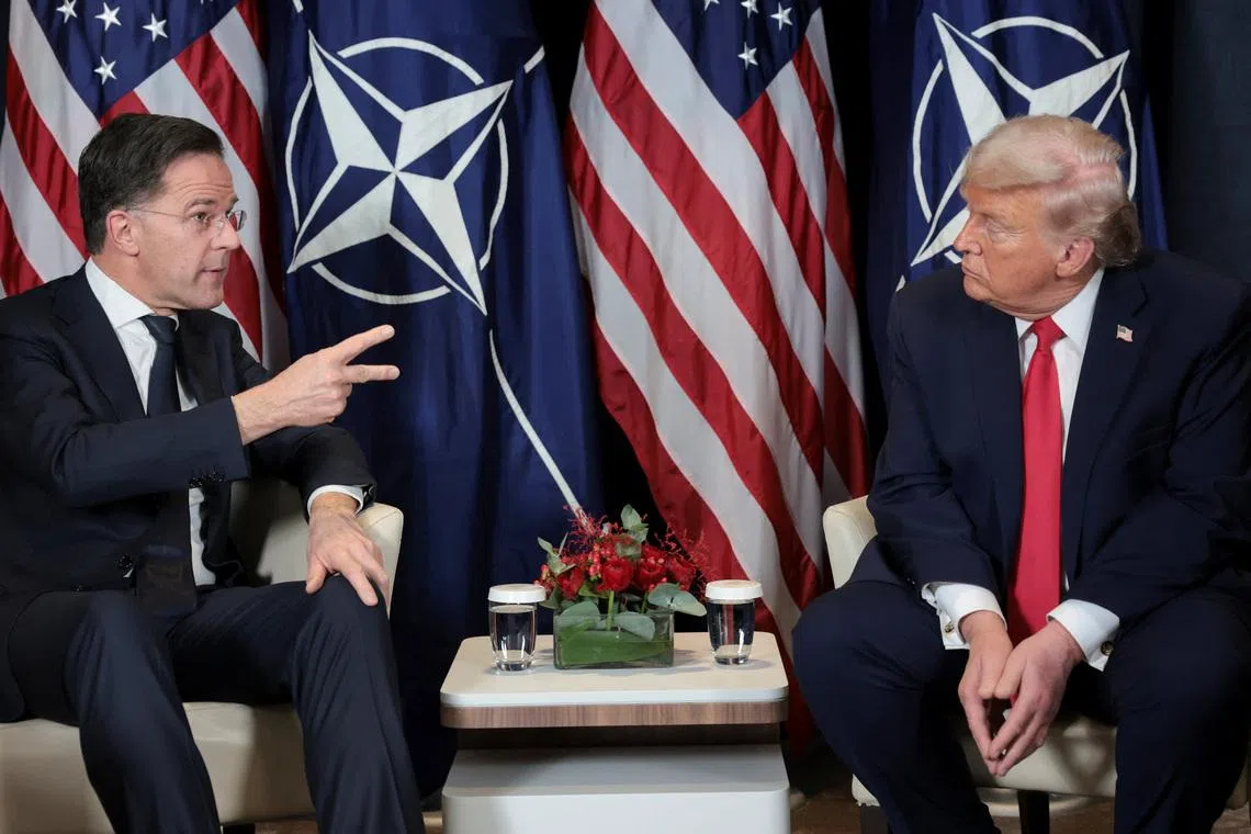 U.S. President Donald Trump holds a bilateral meeting with NATO Secretary General Mark Rutte at the World Economic Forum (WEF) in Davos, Switzerland, January 21, 2026. REUTERS/Jonathan Ernst
