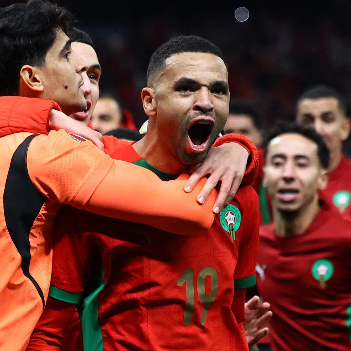 Soccer Football - CAF Africa Cup of Nations - Morocco 2025 - Semi Final - Nigeria v Morocco - Prince Moulay Abdellah Stadium, Rabat, Morocco - January 14, 2026 Morocco's Youssef En-Nesyri and teammates celebrate after winning the match in the penalty shootout REUTERS/Siphiwe Sibeko