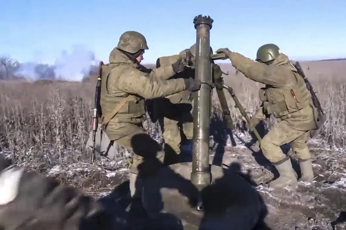 Artillery units of Russia's Marine Corps of the Pacific Fleet providing fire support in the Ugledar direction using 20-mm mortars 2S12 'Sani' at an undisclosed location in Ukraine. 