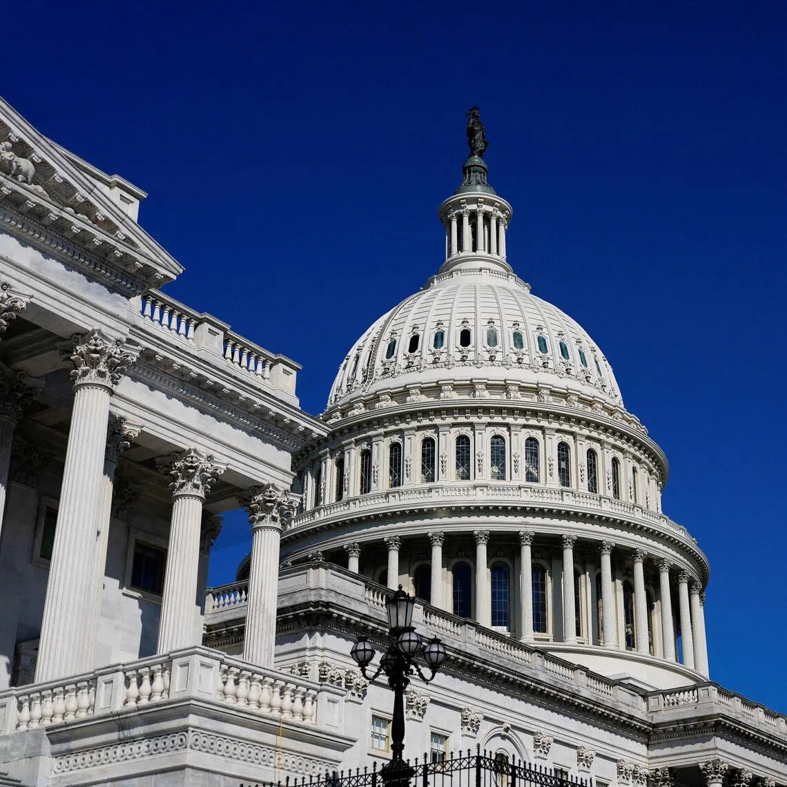 FILE PHOTO: A view of the dome of the U.S. Capitol building, during a vote in the U.S. House of Representatives on a stopgap spending bill to avert a partial government shutdown that would otherwise begin October 1, on Capitol Hill in Washington, D.C. U.S., September 19, 2025. REUTERS/Kent Nishimura/File Photo