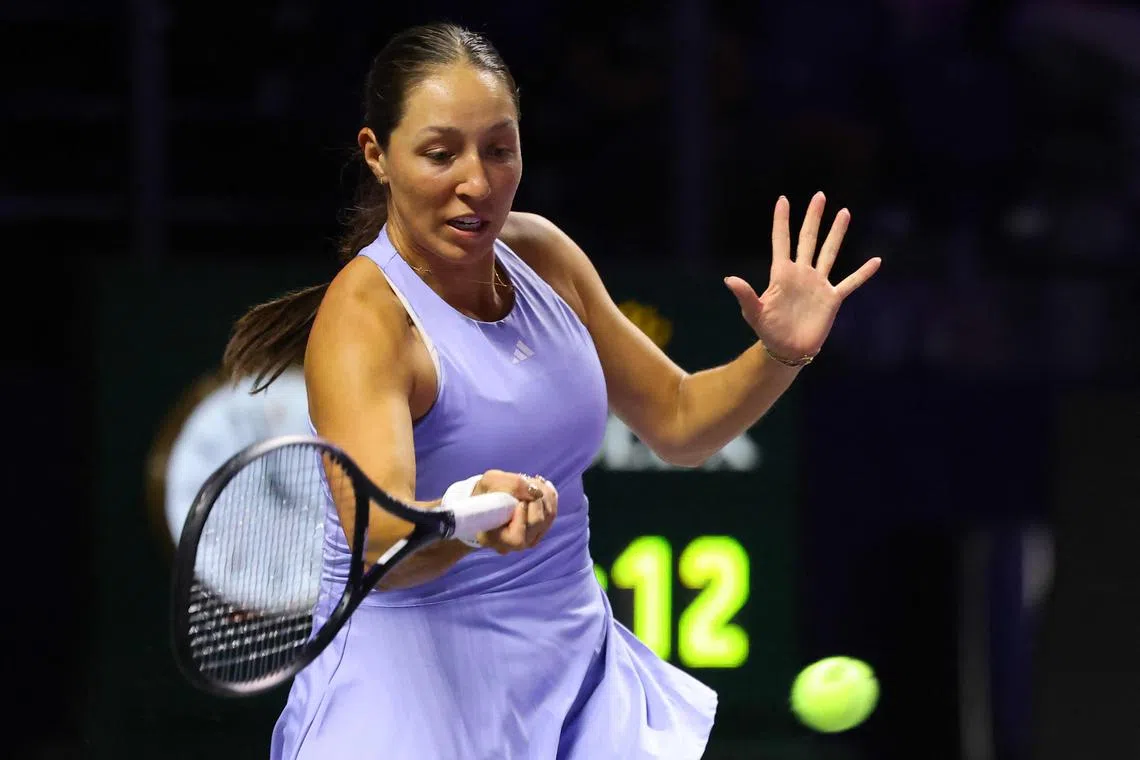 US' Jessica Pegula hits a return against Czech Republic's Barbora Krejcikova during their women's singles tennis match at the WTA Finals Championship in Riyadh on November 5, 2024. (Photo by Fayez NURELDINE / AFP)