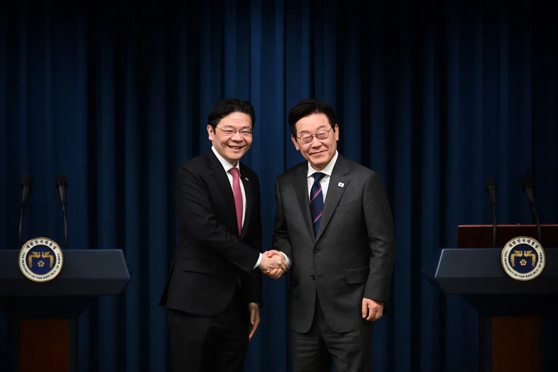PM Lawrence Wong (left) and South Korean President Lee Jae Myung jointly launched a strategic partnership between the two countries in Seoul.
