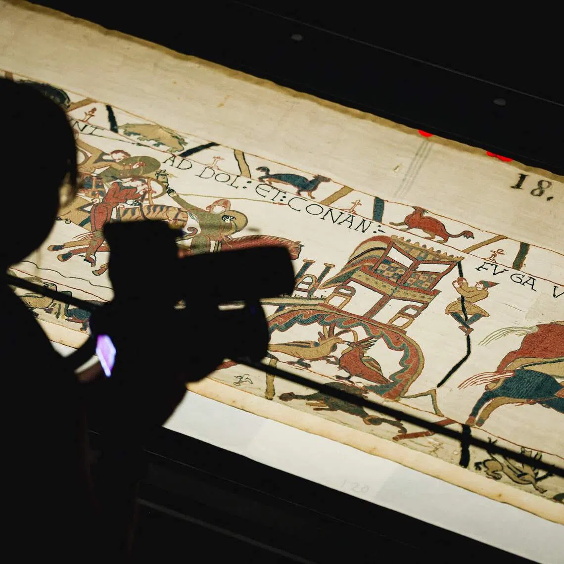 A camera operator videos a section of the Bayeux Tapestry during the press preview at the British Museum in London on Sept 7, 2026.