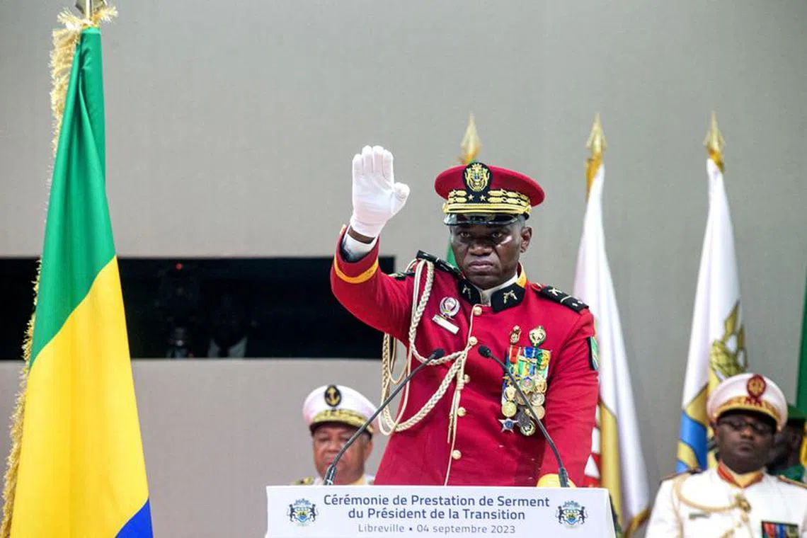 FILE PHOTO: Gabon coup leader General Brice Oligui Nguema is sworn in as interim president during his swearing-in ceremony, in Libreville, Gabon, September 4, 2023. REUTERS/Stringer/File Photo