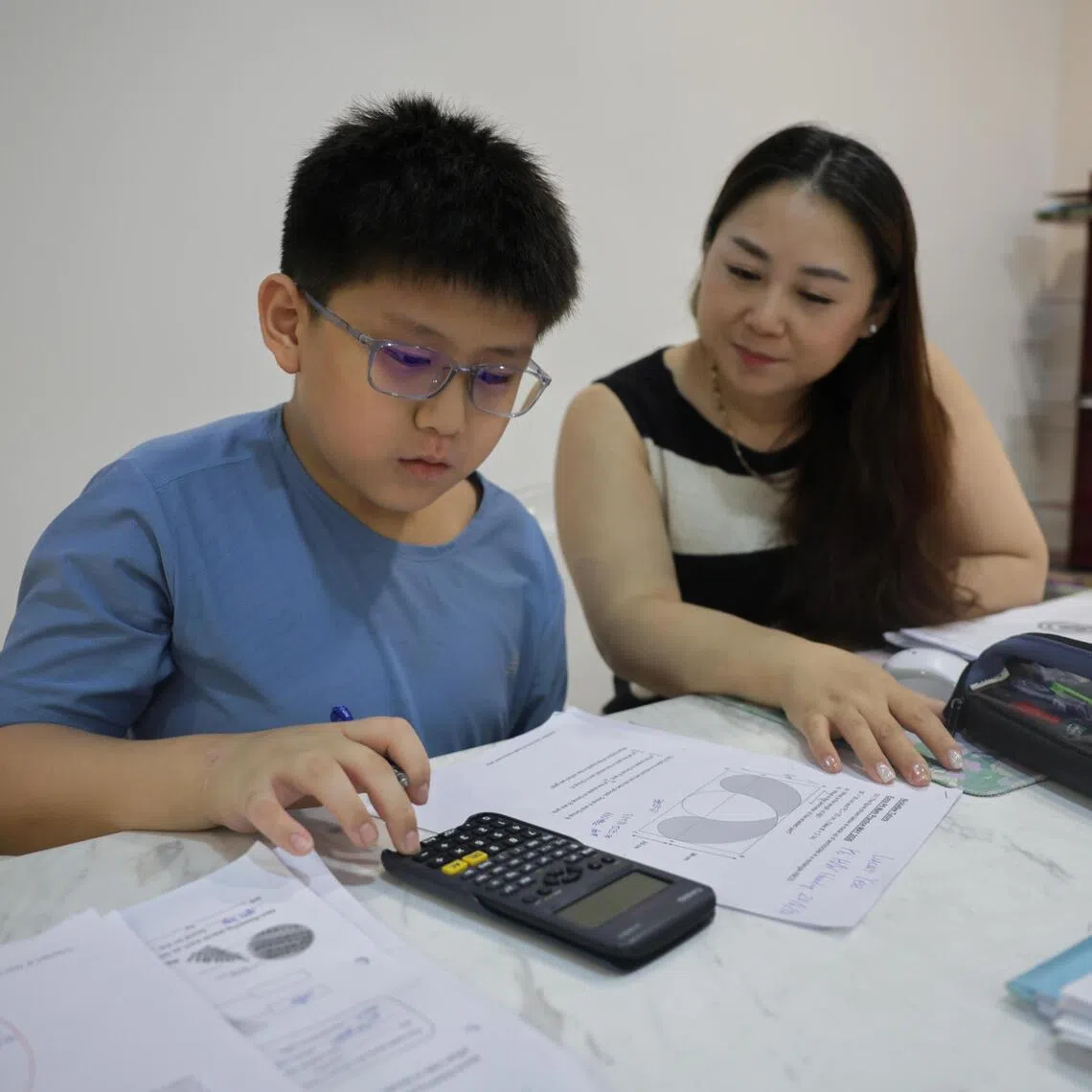Lucas Yee, 12, tends to be careless in mathematics, says his mother, Jessy Liu, 45. 