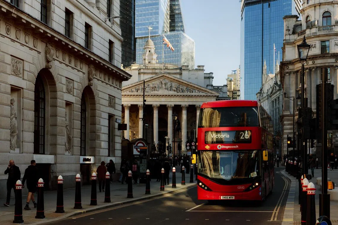 **EMBARGO: No electronic distribution, Web posting or street sales before 12:01 a.m. ET May 28, 2024. No exceptions for any reasons. EMBARGO set by source.**  FILE -- A bus passes through Bank Junction, the historic financial center of London, Jan. 15, 2024. As fears have grown that the city is losing its attractiveness for publicly traded businesses, Britain's government is making changes to bring them back. (Alex Ingram/The New York Times)