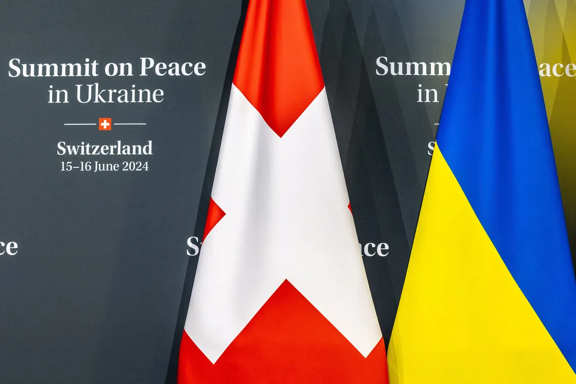 Swiss and Ukrainian flags are pictured at the Buergenstock Resort during the summit on peace in Ukraine in Stansstad, near Lucerne, Switzerland, June 15, 2024. REUTERS/Denis Balibouse