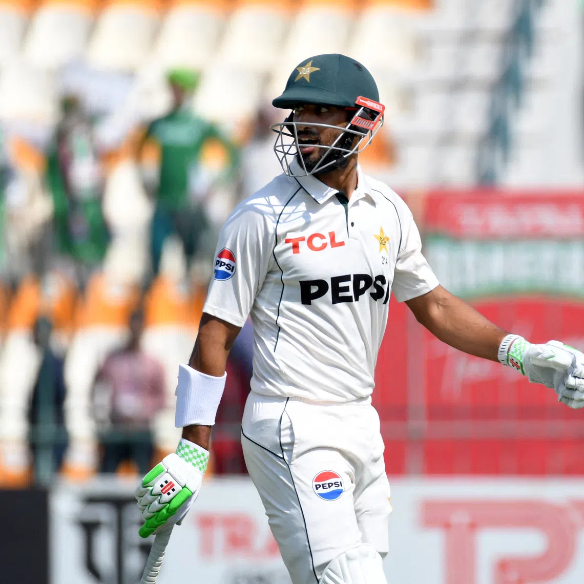 FILE PHOTO: Cricket - Second Test - England v Pakistan - Multan Cricket Stadium, Multan, Pakistan - October 17, 2024 Pakistan's Shan Masood walks back to the pavilion after losing his wicket, caught out by England's Ollie Pope off the bowling of Shoaib Bashir REUTERS/M A Tanveer/File Photo