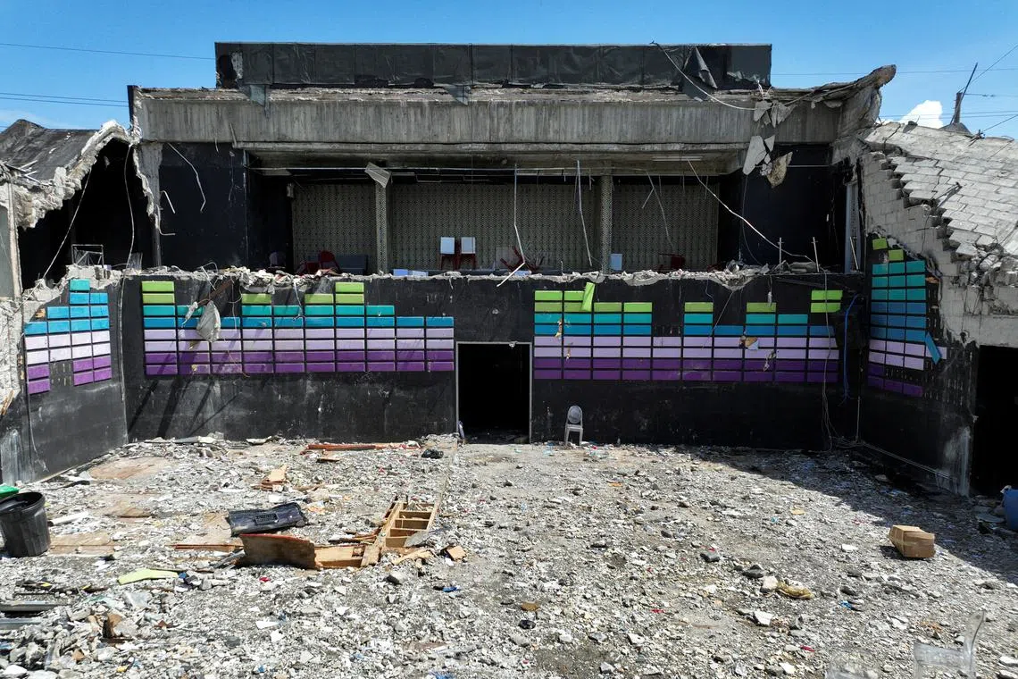 FILE PHOTO: A drone view shows the site of Jet Set nightclub roof collapse, in Santo Domingo, Dominican Republic, April 11, 2025. REUTERS/Ricardo Arduengo/File Photo