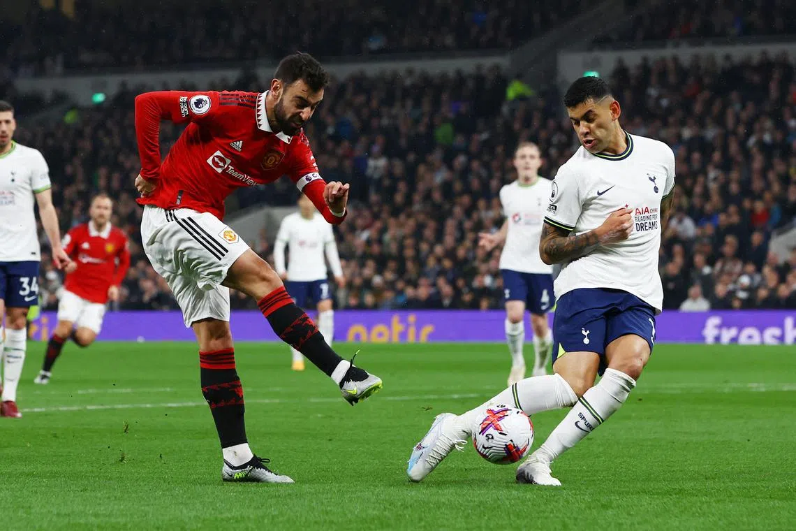 Manchester United's Bruno Fernandes in action with Tottenham Hotspur's Cristian Romero in their 2-2 Premier League draw.