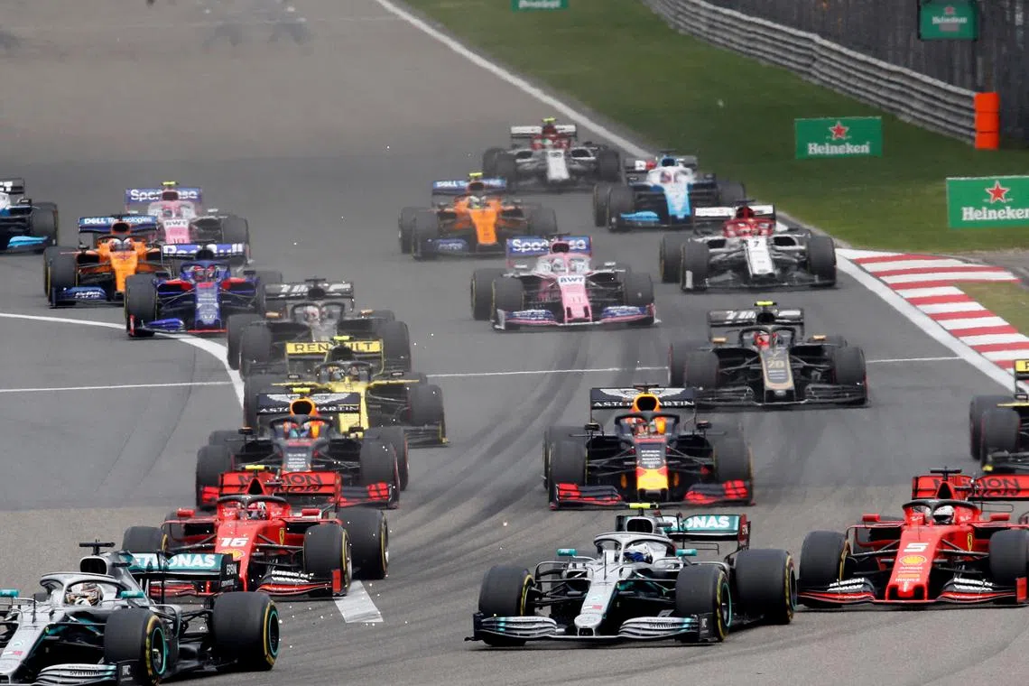 FILE PHOTO: Formula One F1 - Chinese Grand Prix - Shanghai International Circuit, Shanghai, China - April 14, 2019   Mercedes' Lewis Hamilton leads at the start of the race REUTERS/Aly Song/File Photo