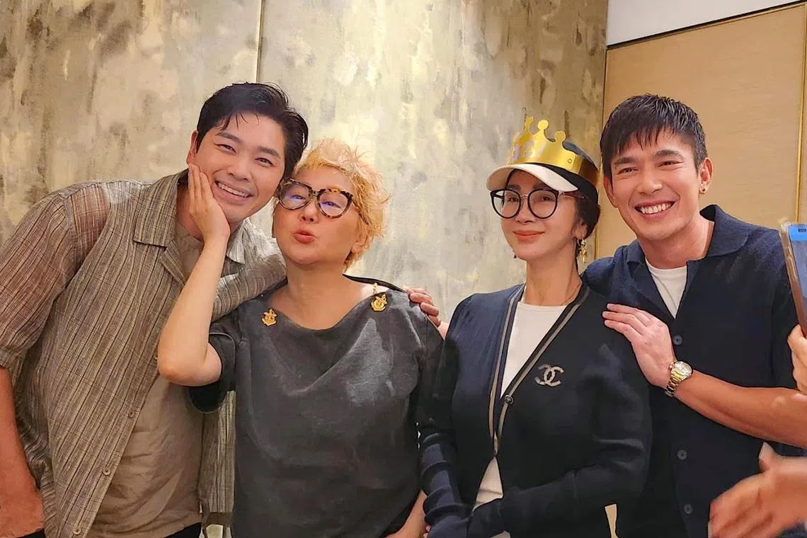 Taiwanese star Chen Mei-fen (second from right) celebrates her birthday with Singaporean actors Romeo Tan (far left) and Elvin Ng (far right) and Taiwanese host Pauline Lan (second from left) in Singapore.