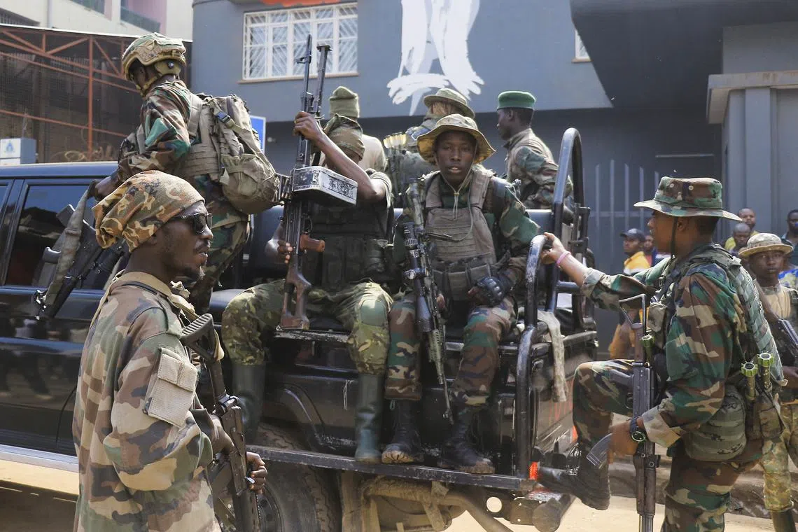 Members of the M23 rebel group gather after recovering guns during a community street cleaning exercise called Salongo, aimed at strengthening local solidarity conducted by members of the M23 rebels, following their takeover of Bukavu, eastern Democratic Republic of Congo, February 20, 2025. REUTERS/Victoire Mukenge