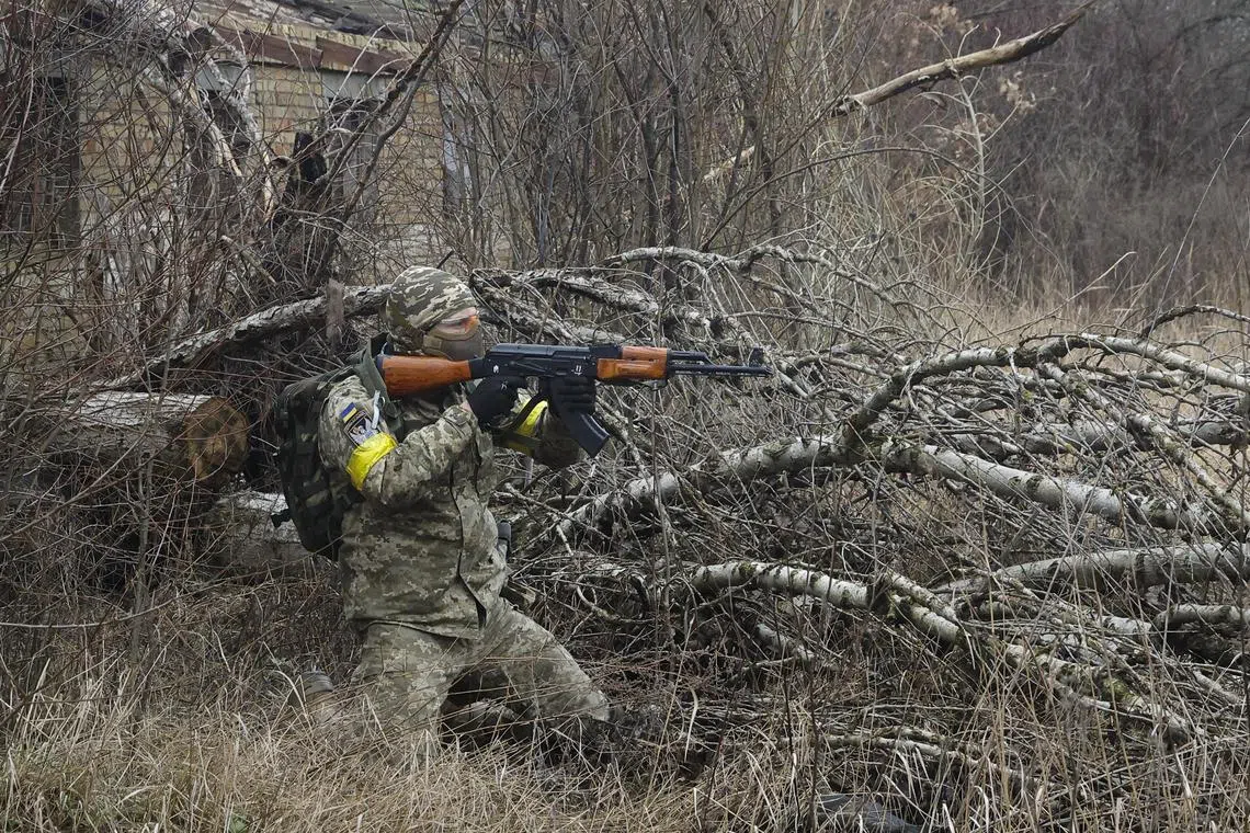 Ukrainian civilians taking part in military training near Kyiv at the weekend. 
