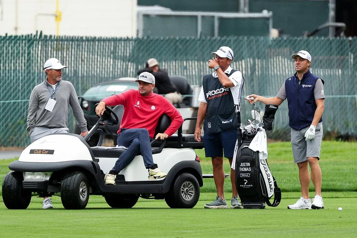 Keegan Bradley looks on while watching Justin Thomas play the 16th hole prior to the Procore Championship.