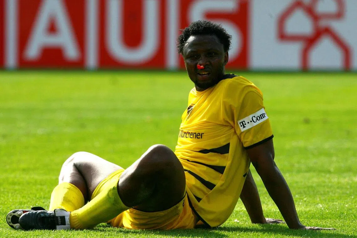 Alemannia Aachen's team captain Moses Sichone, who has take over as Zambia coach, is distraught after their relegation from the German Bundesliga on May 12, 2007.