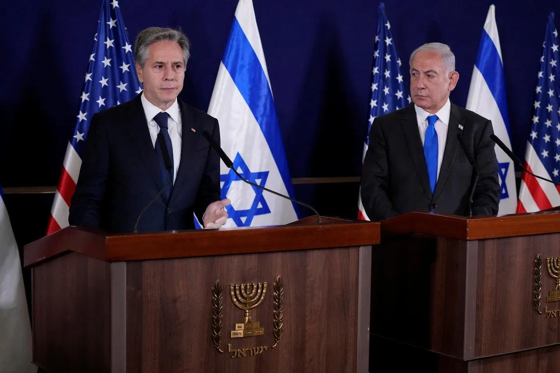 U.S. Secretary of State Antony Blinken and Israel’s Prime Minister Benjamin Netanyahu make statements to the media inside The Kirya, which houses the Israeli Ministry of Defense, after their meeting in Tel Aviv, Israel, Thursday Oct. 12, 2023. Jacquelyn Martin/Pool via REUTERS