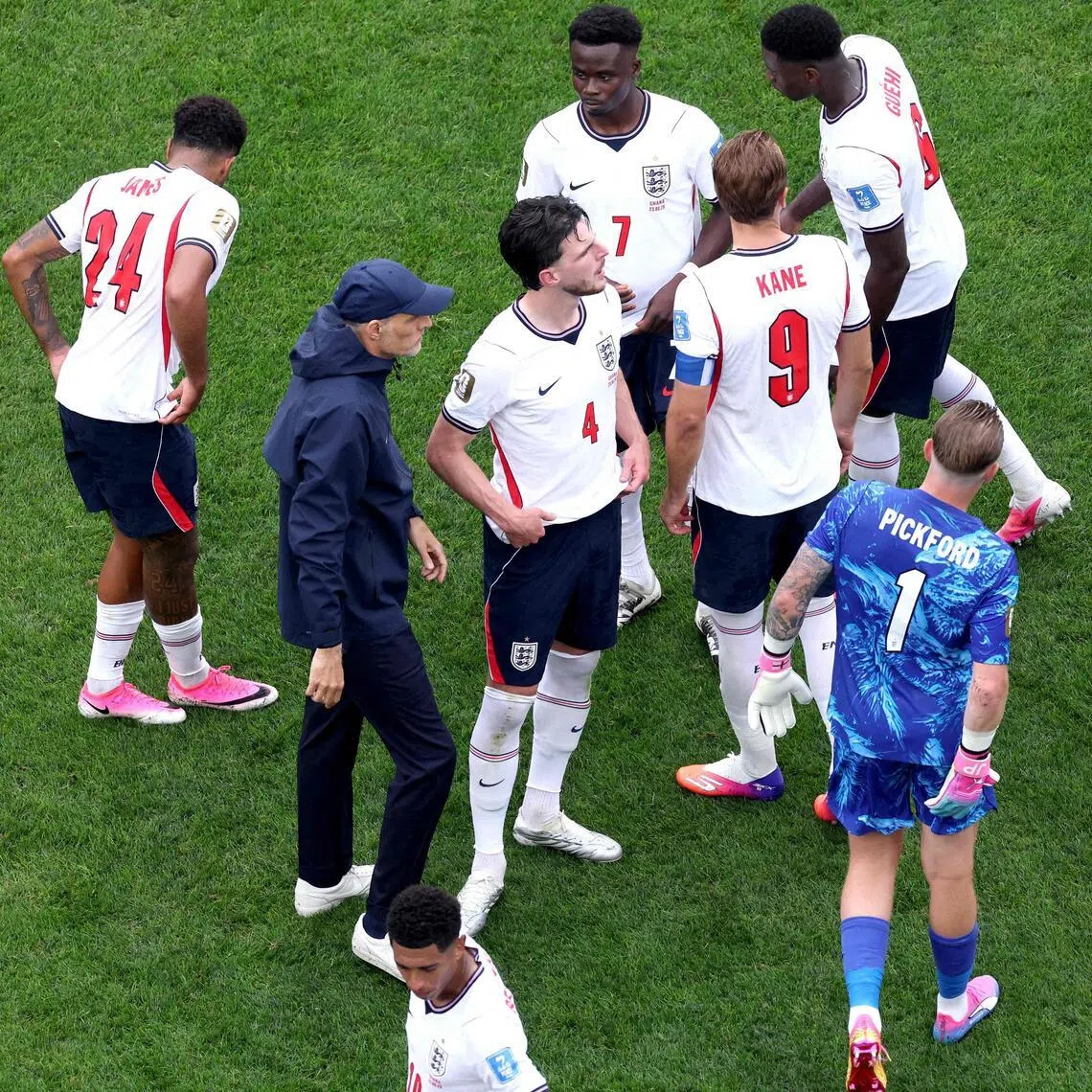 England manager Thomas Tuchel speaking to his players during a hydration break at the World Cup match against Ghana at Boston Stadium on June 23.