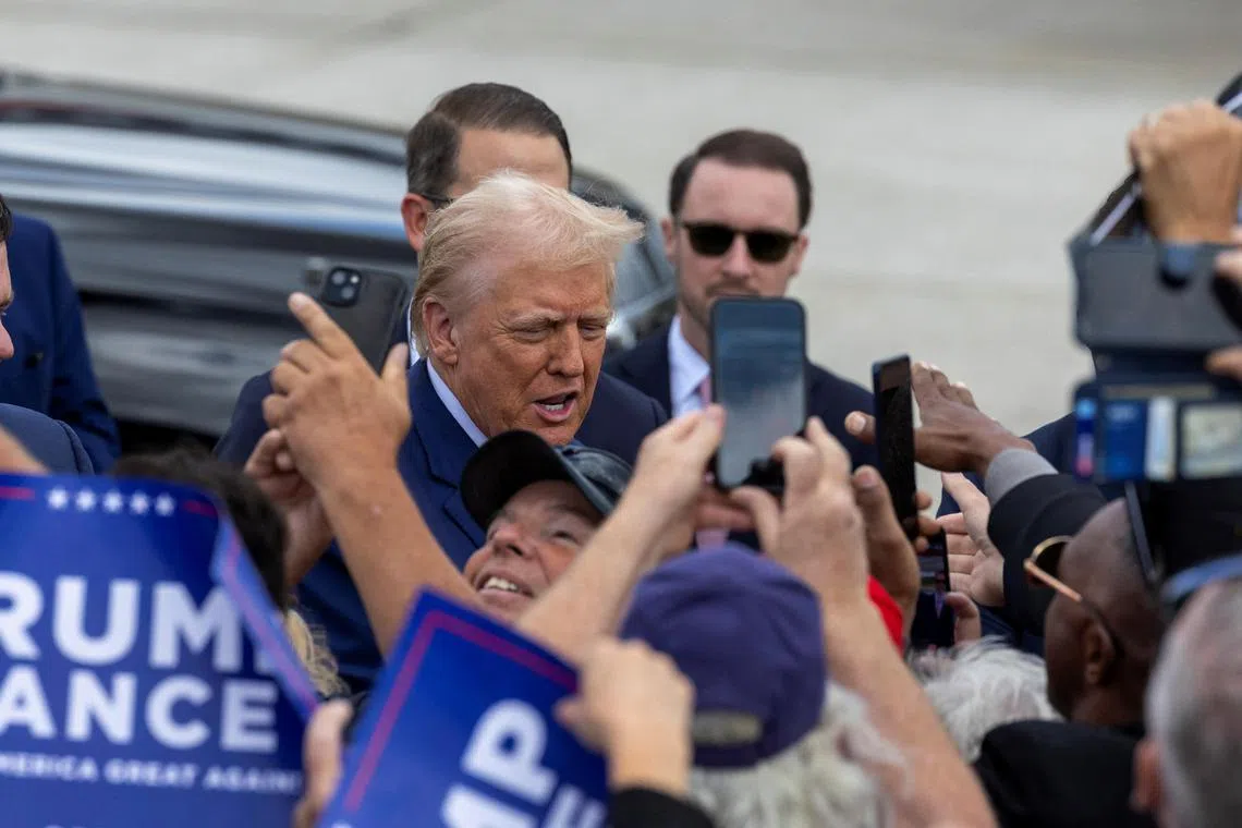 Republican presidential candidate and former US president Donald Trump greeting supporters in Romulus, Michigan, on Aug 20.