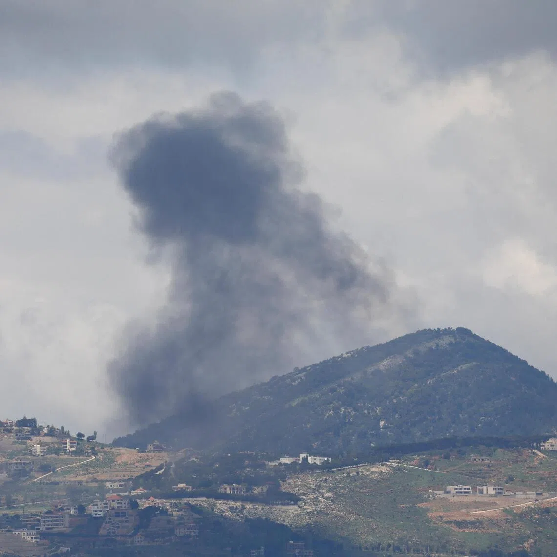 Smoke rises in southern Lebanon as seen from Marjayoun, May 6. 