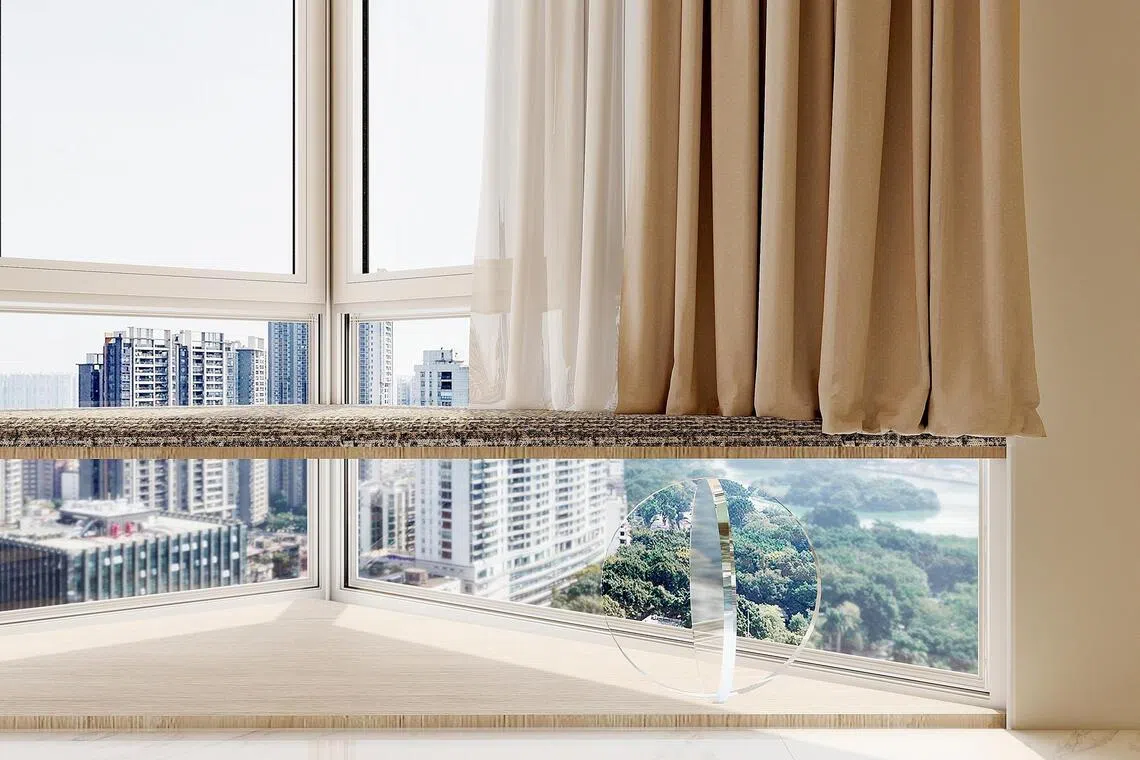 A bay window with floating credenza to accommodate a cat’s favourite sunbathing spot.