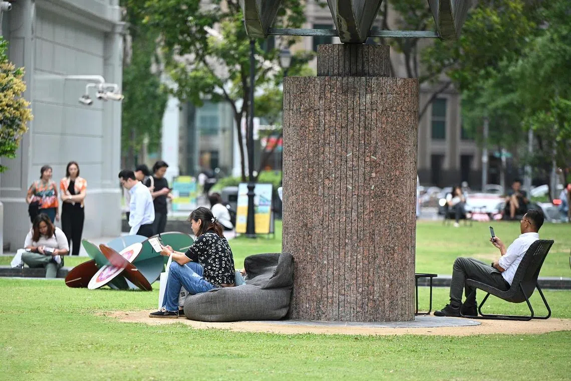 Pixgeneric / Generic pix of people resting and chilling at Raffles Place in Singapore on March 14, 2024.