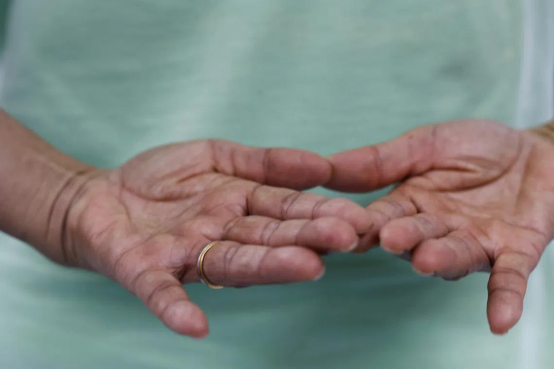 Dorothy Tam, 60, practicing during a Wing Chun class on July 14. "I discovered it's actually a martial art suitable for women as well, emphasizing softness to overcome hardness," said Tam. "Martial arts are not solely about fighting. My instructor often emphasises that self-defense is about avoiding conflict and focusing on self-improvement." 