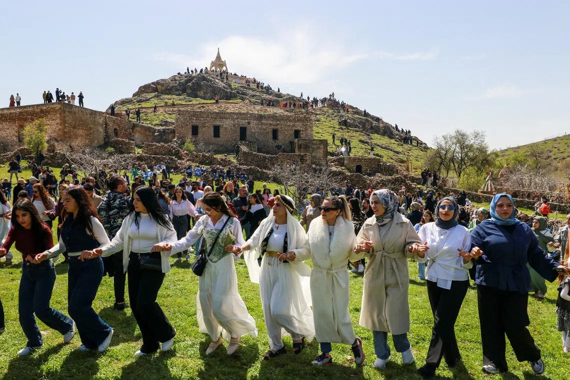 Yazidis celebrate Red Wednesday, which is the day known and accepted as the Yazidi New Year, the arrival of spring and nature's awakening, at Magara village of Sirnak province, Turkey, April 15, 2026. REUTERS/Ensar Ozdemir TPX IMAGES OF THE DAY