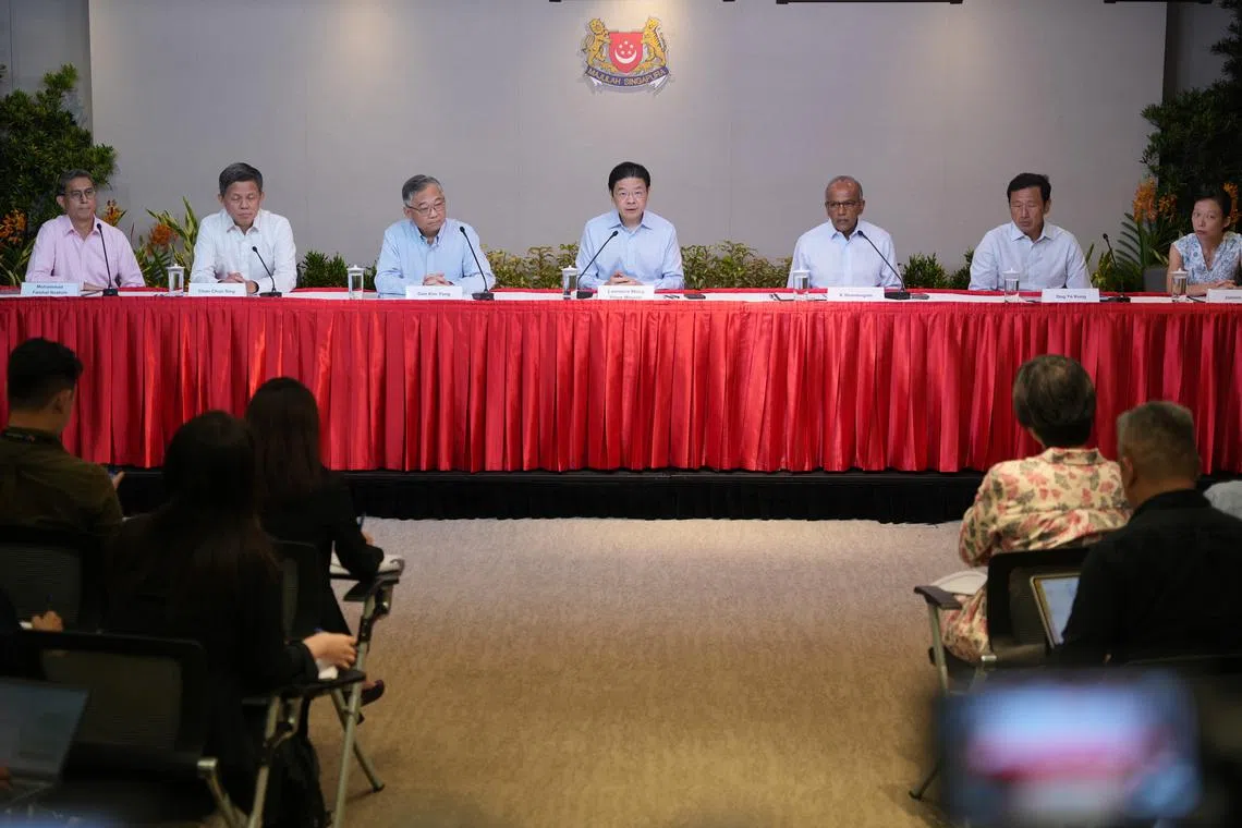 Prime Minister Lawrence Wong (centre) announced his Cabinet for the new term of government at a press conference on May 21.