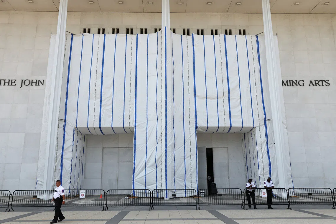 Security keeps watch at the main entrance to the John F. Kennedy Center for the Performing Arts as the centre’s board voted to inscribe onto the building “Restored and Renovated by President Donald J. Trump”, in Washington DC, on Aug 13.