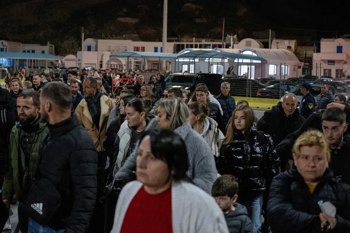 People board a ferry to Piraeus, following an increase in seismic activity on the island of Santorini, Greece, February 4, 2025. REUTERS/Alkis Konstantinidis
