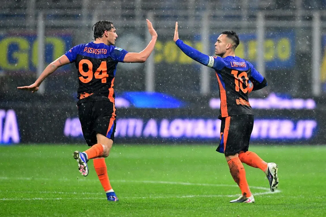Soccer Football - Serie A - Inter Milan v Pisa SC - San Siro, Milan, Italy - January 23, 2026 Inter Milan's Lautaro Martinez celebrates scoring their second goal with Francesco Pio Esposito REUTERS/Daniele Mascolo