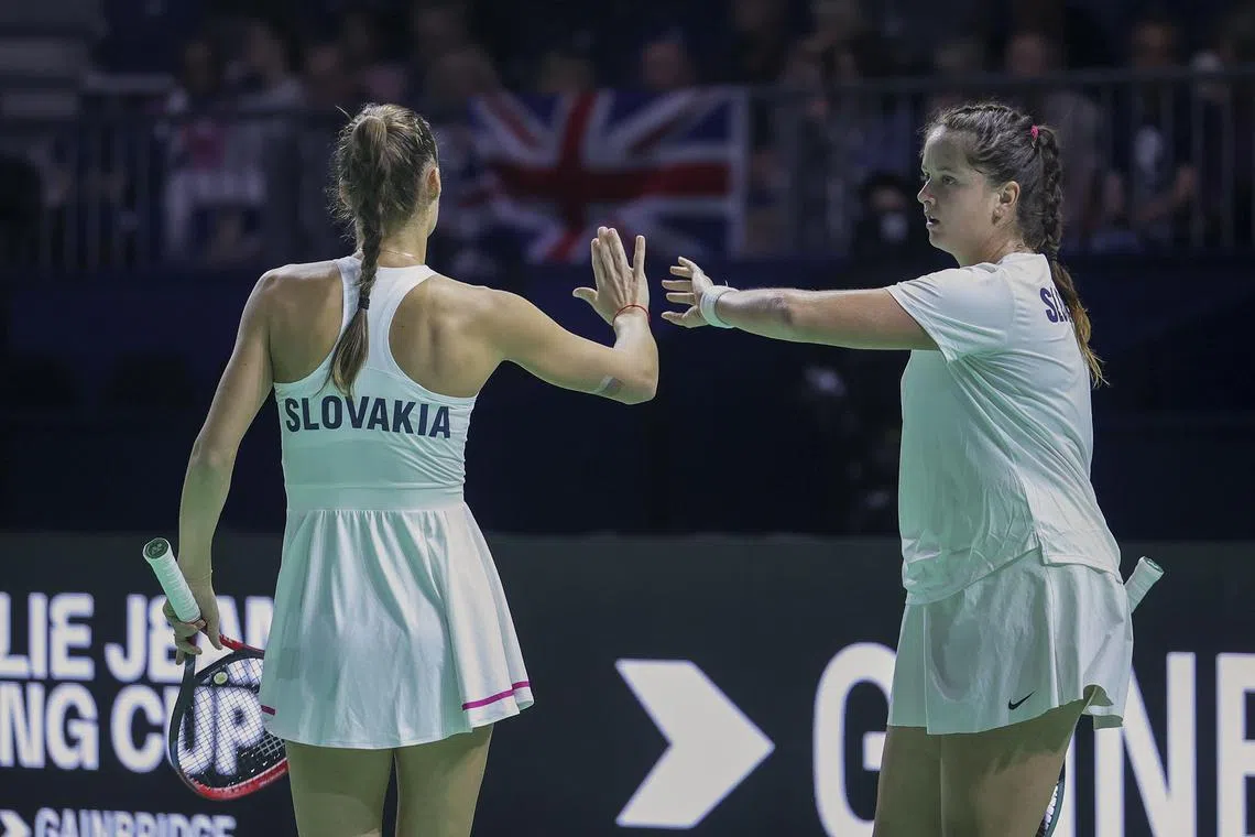 Slovakia's Viktoria Hruncakova (left) and Tereza Mihalikova saw off British duo Olivia Nicholls and Heather Watson 6-2, 6-2 in the decisive rubber.