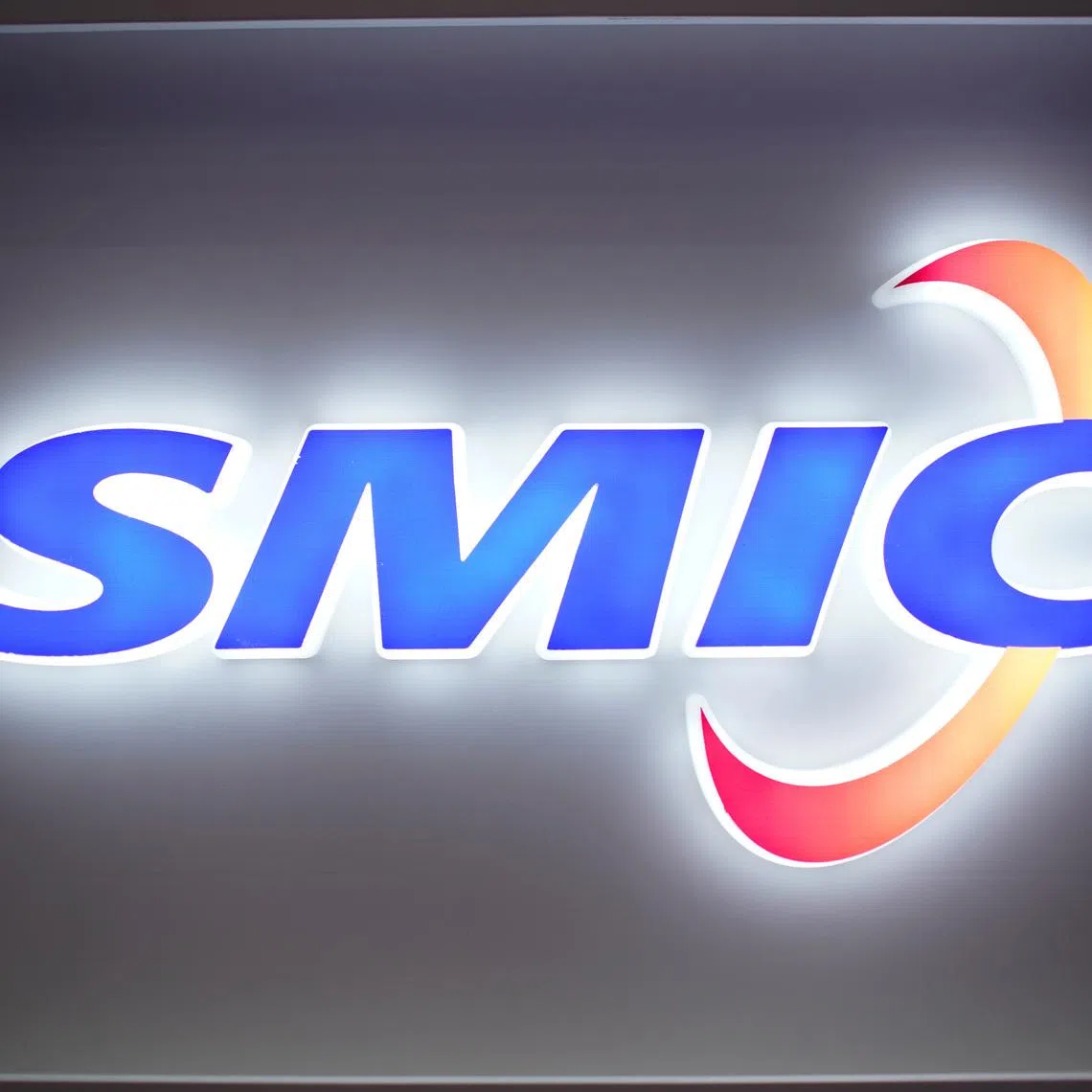 A logo of Semiconductor Manufacturing International Corporation (SMIC) is seen at China International Semiconductor Expo (IC China 2020) in Shanghai, China October 14, 2020.
