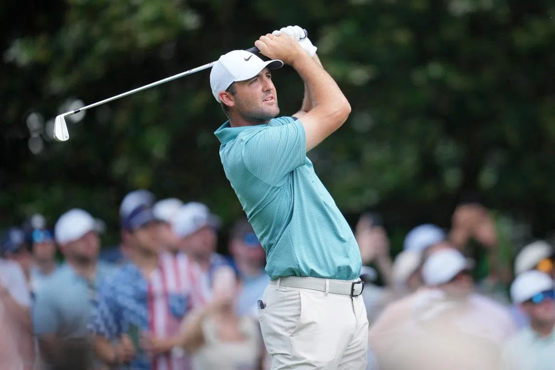 May 17, 2025; Charlotte, North Carolina, USA; Scottie Scheffler tees off on the sixth hole during the third round of the PGA Championship golf tournament at Quail Hollow. Mandatory Credit: Aaron Doster-Imagn Images