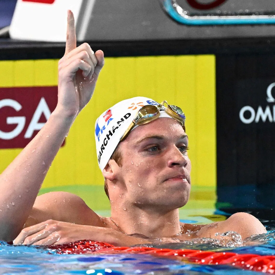 France's Leon Marchand celebrates winning the final of the men's 400m freestyle at the European championships in Paris on Aug 16.