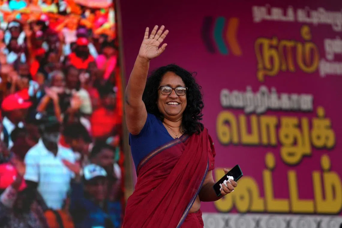 Sri Lanka's Prime Minister Harini Amarasuriya waves to her party National People's Power (NPP) supporters during a rally on the last day of campaigning for the 17th Parliamentary Election in Piliyandala suburb in Colombo, Sri Lanka, November 11, 2024. REUTERS/Thilina Kaluthotage/File Photo