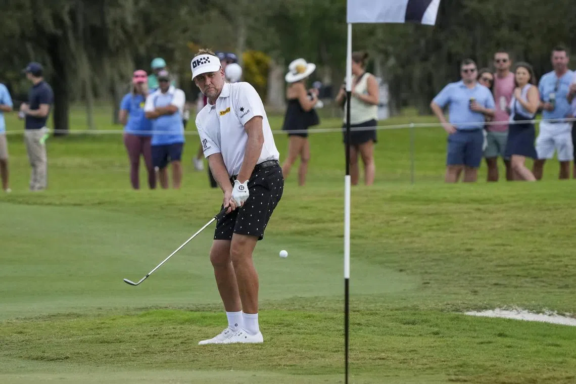 Ian Poulter plays an approach shot on the seventh hole during the semif-inals of the LIV Golf Invitational - Miami at Trump National Doral Miami on Oct 29, 2022.