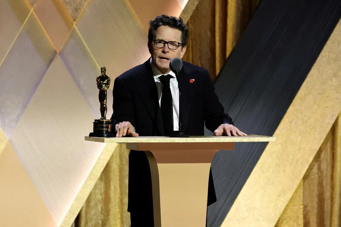 Actor Michael J. Fox accepts the Jean Hersholt Humanitarian Award at the 13th Governors Awards in Los Angeles on Nov 19, 2022. 
