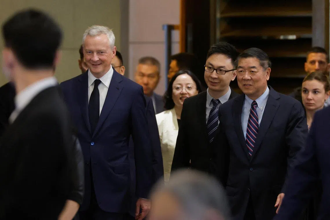 French Economy and Finance Minister Bruno Le Maire and China's Vice Premier He Lifeng arrive at the Diaoyutai State Guesthouse for the China-France Economic and Financial Dialogue in Beijing, China, July 29, 2023. REUTERS/Thomas Peter