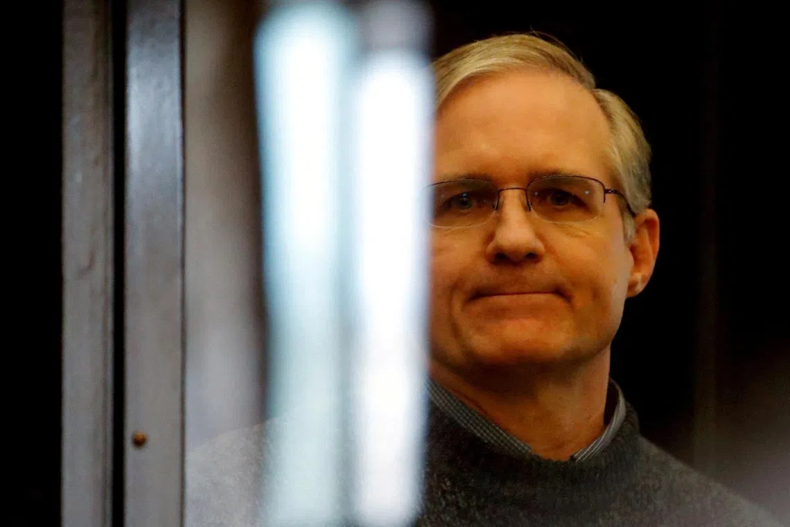 A 2020 photo shows former US Marine Paul Whelan standing in a defendants' cage, during his verdict hearing in Moscow.