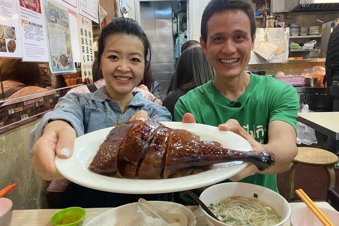 Ms Virginia Chan with US YouTuber Mark Wiens at the famed Yat Lok roast goose noodles eatery in Central.