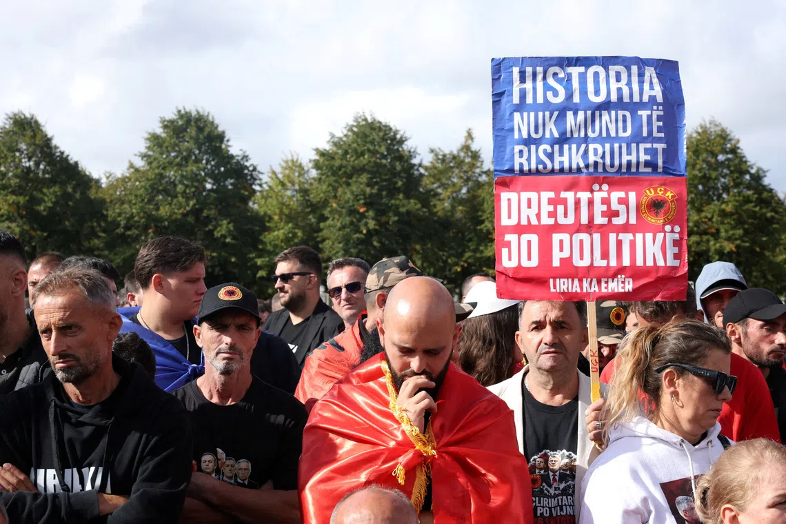 Supporters of former Kosovo President Hashim Thaci react after he was found guilty of war crimes by the Kosovo war crimes tribunal, in The Hague, Netherlands, September 16, 2026. REUTERS/Omar Havana