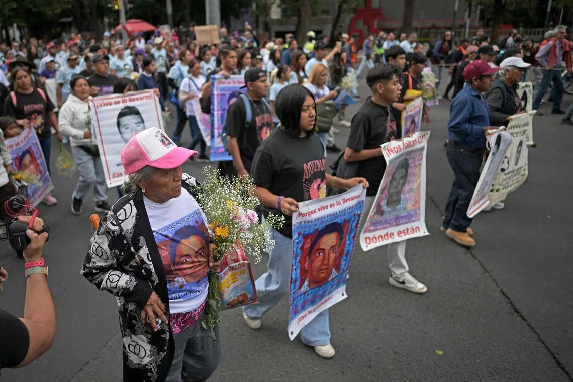 Thousands protest ahead of Mexican president’s report on missing students