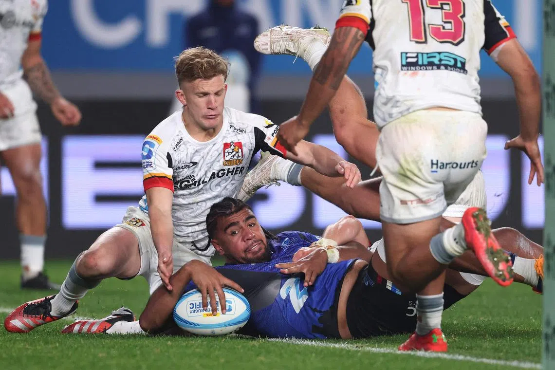 The Auckland Blues' Hoskins Sotutu scoring a try in their 31-17  Super Rugby win over the Waikato Chiefs at Eden Park on June 1, 2024.