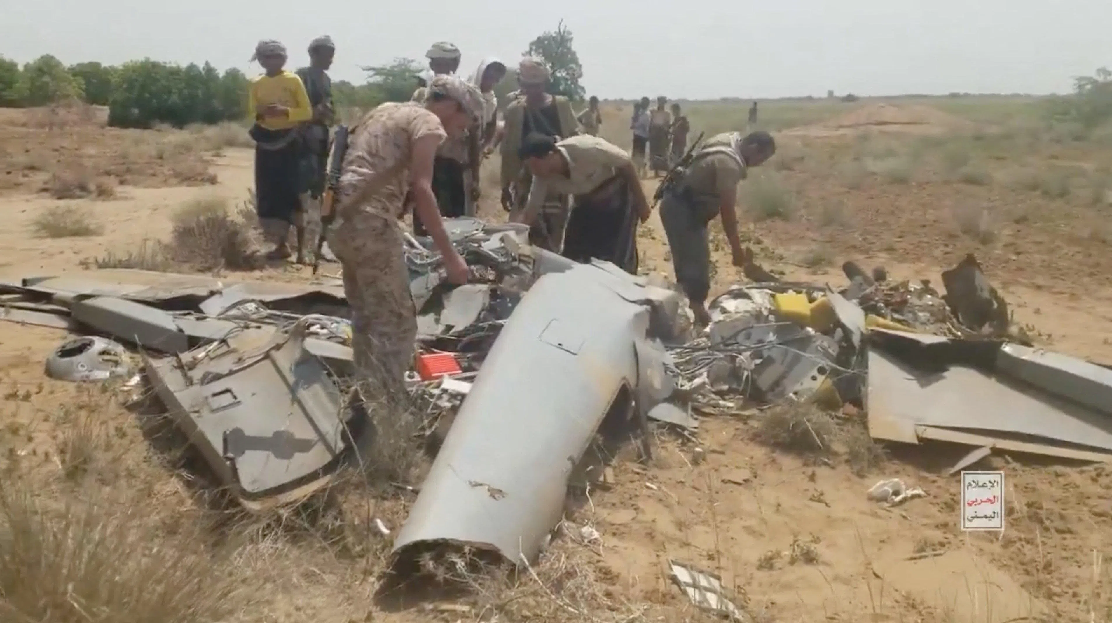 A video screengrab from Sept 10 shows Houthis inspecting wreckage which they say is an armed Saudi Arabian reconnaissance drone, in a location given as Hajjah, Yemen.