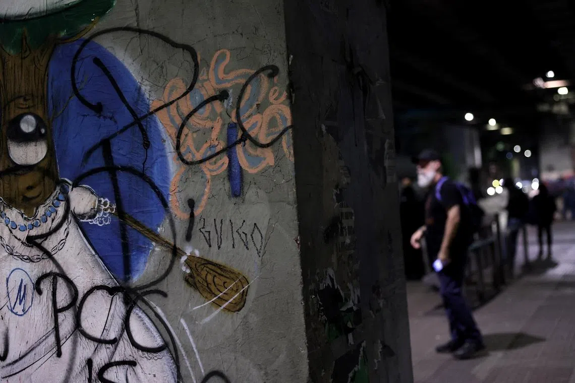 People walk past graffiti reading \"PCC\", referring to Brazilian drug gang Primeiro Comando da Capital, after U.S. Secretary of State Marco Rubio announced a policy to designate \"PCC\" and Comando Vermelho \"CV\" as foreign \"terrorist organizations\", in Sao Paulo, Brazil, May 31, 2026. REUTERS/Amanda Perobelli