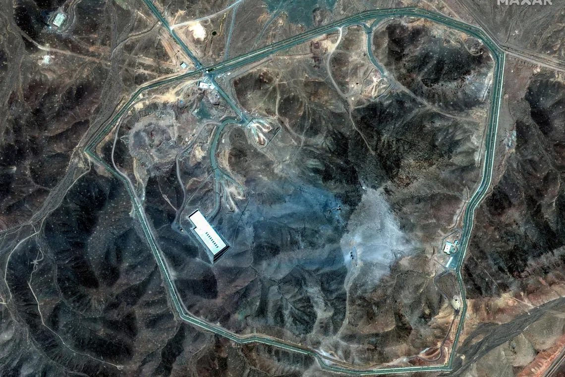 A Maxar satellite image showing the site of  Iran's underground Fordow nuclear complex, after it was hit in US bunker busting strikes on June 22.