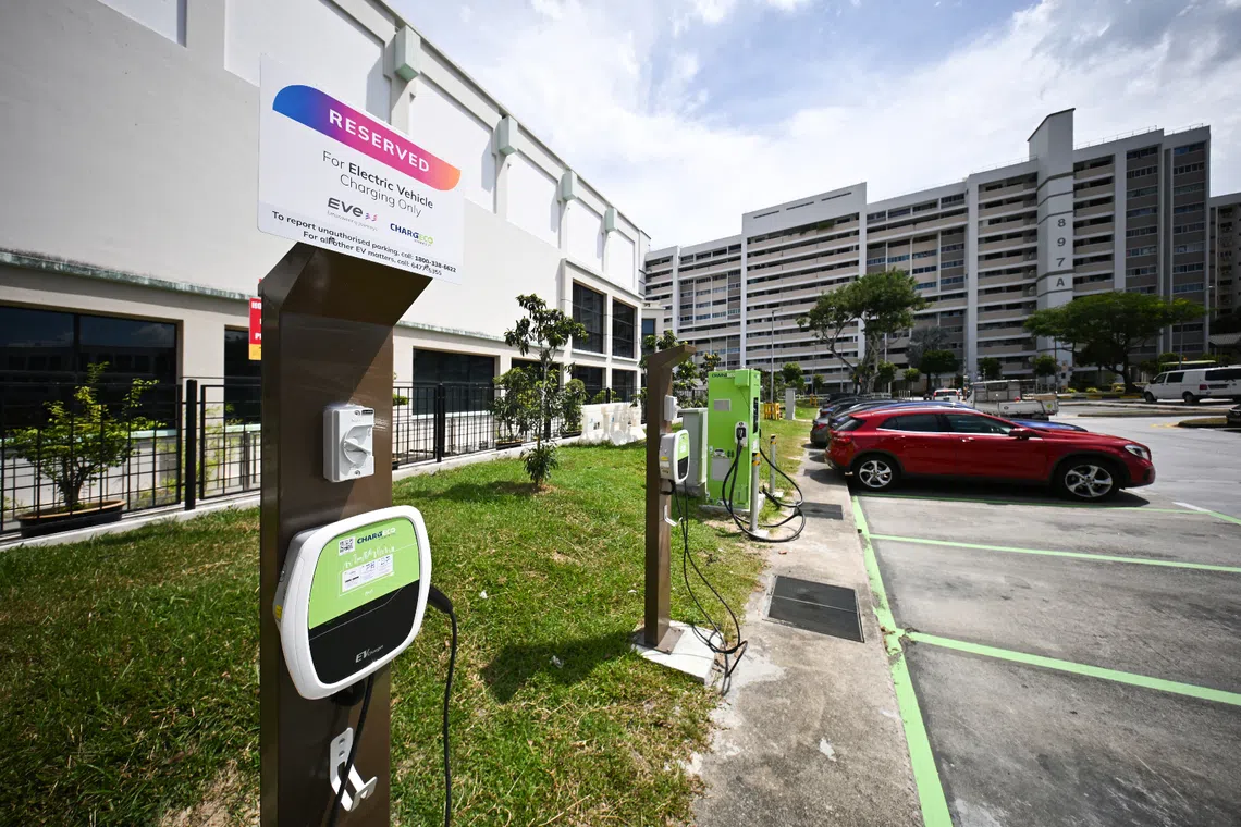 Electric vehicle charging points at a carpark near Block 828 Tampines Street 81. More than 1,600 HDB carparks now have EV chargers.